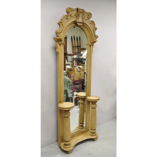 Antique American Victorian 88" Tall Hall Entry Mirror with Pedestal Plant Stands. Item features a tall arched mirror,...