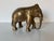Elegant and timeless, this vintage solid brass elephant sculpture embodies classic craftsmanship and symbolic grace. Hand-...