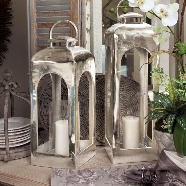 Go big on glam with this largescale statement lantern in a champagneGold finish. Made of cast aluminum, a sophisticated...