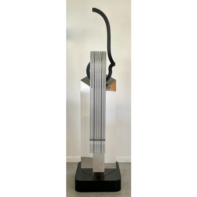 Stunning Postmodern tower sculpture from '94 by Norbert L.Witkowski (American 20th Century). Base is in black mica, body...
