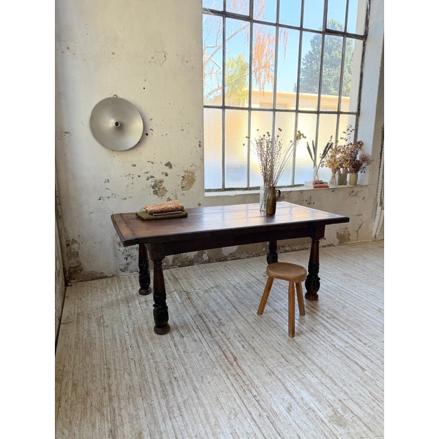 Antique 19th-century castle or dining table in solid oak with a dark patina. We love the simplicity of the tabletop, which...