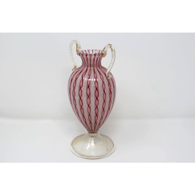 Price reduced $100. Now only $495! Spectacular example of Murano Glass using the latticino treatment of caned glass. A...