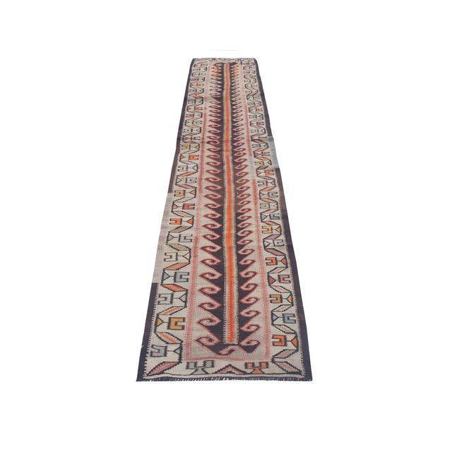 Vintage handwoven decorative kilim rug from Kars region of Turkey. Approximately 50-60 years old. In very good condition.
