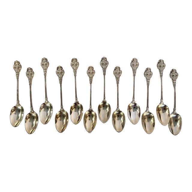 Set of 12 Jacobi & Jenkins Sterling Silver Soup Spoons in a Renaissance Style Pattern, Circa 1900 For Sale