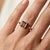 Bold, earthy, and sophisticated, this stunning Toi et Moi ("You and Me") ring pairs two striking, emerald-cut Smoky Quartz...