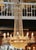 A Large Waterford grand ten-arm chandelier. Ten lights with five more interior lights with cut plume top crown underneath...