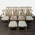 Bamboo/Rattan chairs consisting of 8 side chairs and 2 armchairs, with upholstered seat cushions. Brand: McGuire....