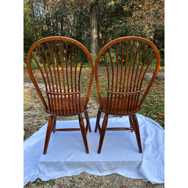 Nichols and Stone is a name synonymous with American Windsor chairs. This pair is the high back style or bow back. They...