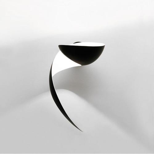 Wall lamp model 'flame wall lamp' designed by serge mouille in 1962. manufactured by editions serge mouille in france. The...