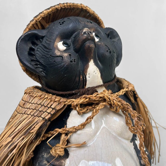 Characterful ceramic figure of a traditional Japanese tanuki, crafted in the 1960s – likely in Shigaraki, a region...