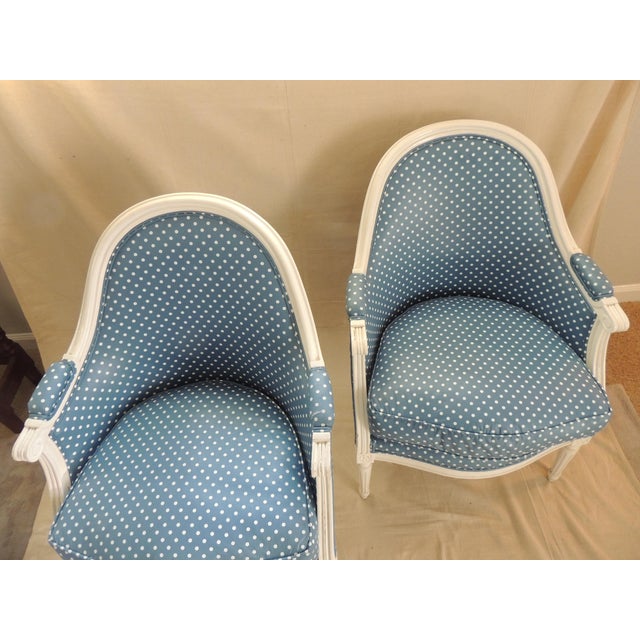 Antique French Louis XVI Style Upholstered Barrel Back Armchairs - A Pair Late 19th century Bergeres, painted white wood...