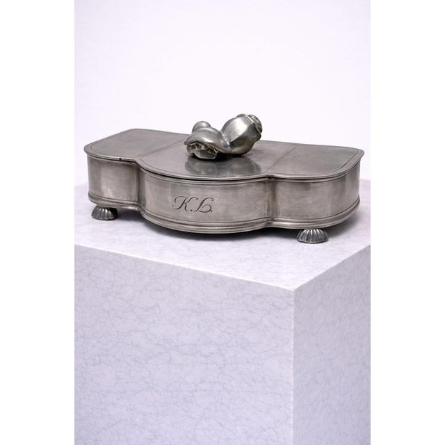 An elegant and finely crafted swedish art deco pewter jewelry box produced by gab (guldsmedsaktiebolaget) in 1933. This...