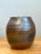 Wheel-thrown with balanced ovoid contours and authentic studio pottery charm, this vintage mid-century ceramic vase...