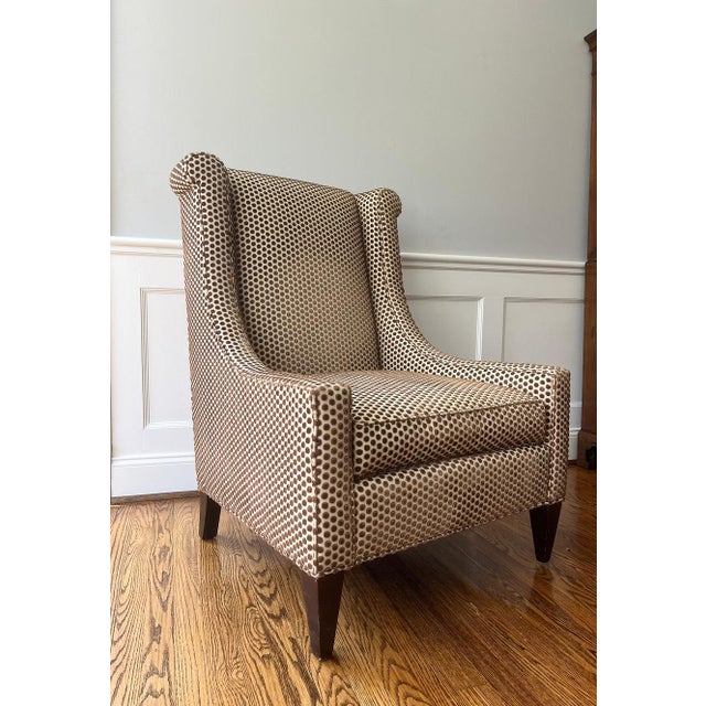 This chic cut velvet chair features brown dots on a cream colored field. One detached seat cushion. Like new condition....