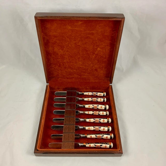 A set of eight English Staffordshire porcelain Imari pattern handled table knives, circa 1849 - 1860, in the manner of...
