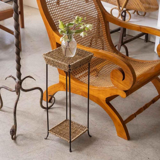 Unique two-tier rush and iron side table from France, 1960s. Woven rush table top with iron legs and lower shelf. Original...