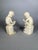 Two 19th-century white marble sculptures depicting a child scribe and a child reading, after Lemire (Charles Gabriel...