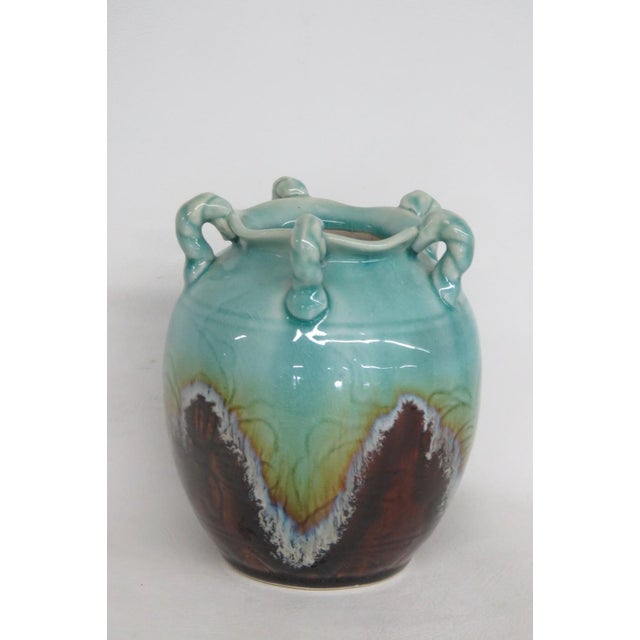 This gorgeous Art Pottery Vase / Jug is made out of ceramic with a crackle glaze finish. This stunning vase features a...
