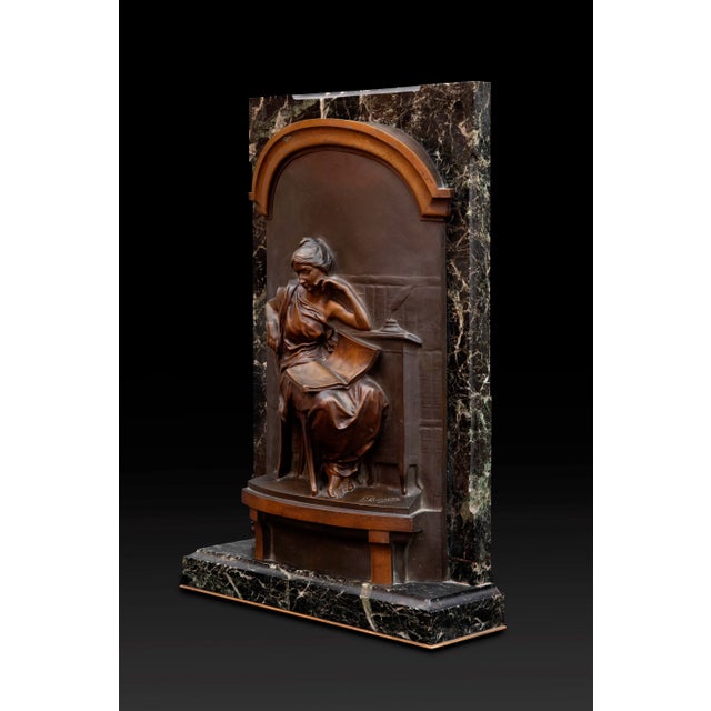 Bas-Relief: "La Liseuse" (The Reader) is a bas-relief created by Louis-Ernest Barrias, a renowned 19th-century sculptor....