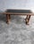 Sculptural vintage coffee table made from solid oak, featuring a dark slate inset decorated with engraved zodiac-inspired...