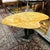 Low side table in the shape of a painters palette. Made of resin and faux painted to resemble marble. The base has the...