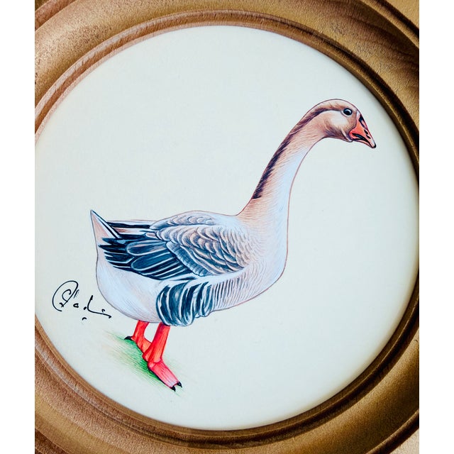 With her proud stance, curious expression, and perfectly webbed orange feet, this Goose is full of charm. Every delicate...