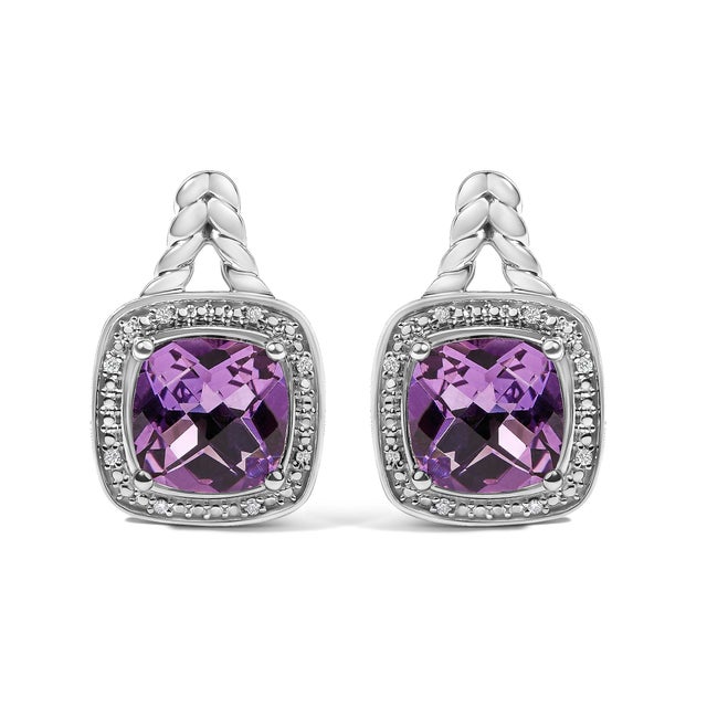 Indulge in the regal allure of these dazzling drop earrings, beautifully crafted from .925 sterling silver and adorned...