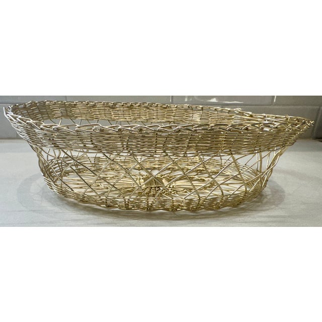 Handwoven from Silver colored wire (uncertain as to metal, since there are no hallmarks or manufacturing marks -...