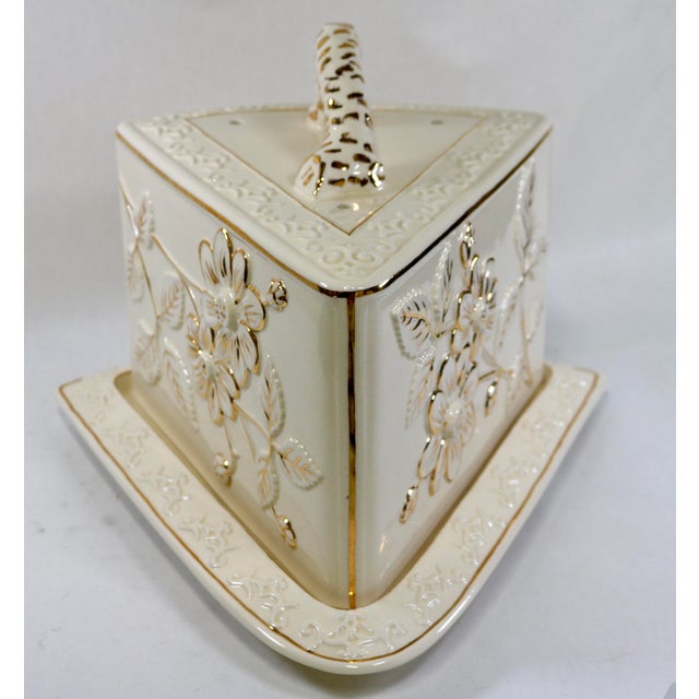 Elevate your charcuterie spread or holiday buffet with this rare, retired two-piece cheese keeper set from luxury home...