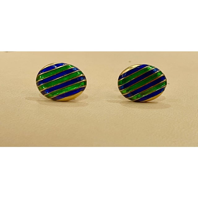 Its Vintage Classic cufflinks in high-polished 14 karat yellow gold, with green and blue enamel on them. measurements 21 X...