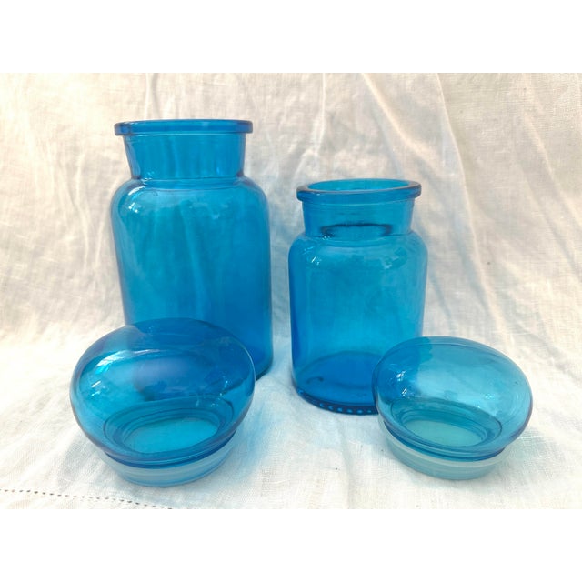 Vintage Blue Apothecary Blue Bottle with Bubble topper. These are perfect for decoration in any room of the home. Sourced...