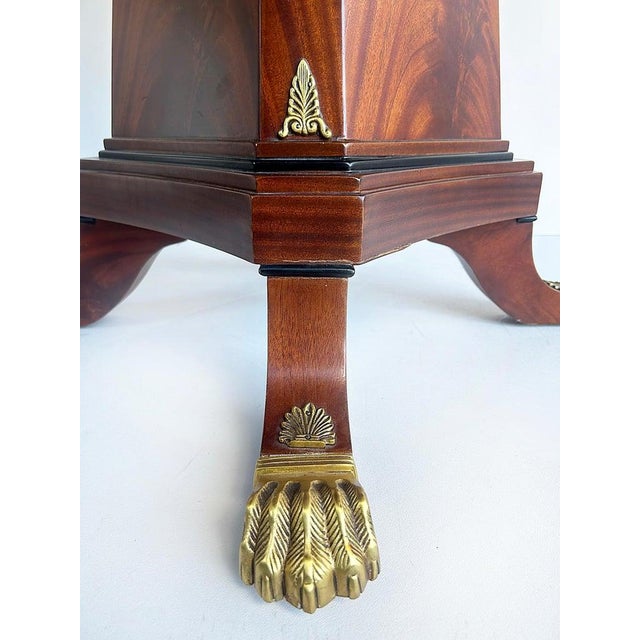 Regency Style Round Pedestal Table, Greek Key Inlay & Bronze Claw Feet & Mounts Offered for sale is a Regency-style...