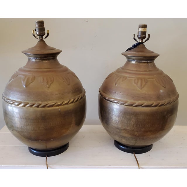 Pair of Vintage, Round, Rope & Leaf Design Brass lamp with black wood base. It takes a 3 way bulb.