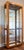 Wood Vintage-Style Tall Oak Curio Display Cabinet W/ Illuminated Glass Shelves, Magnetic Doors & Antique Brass Knobs For Sale - Image 7 of 18