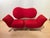 Extraordinary postmodern two-seater design sofa "arnold" by bonaldo in red fabric. Large curved back cushion and 2 seat...