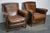 This pair of cognac-colored leather club chairs come from the Netherlands. They are upholstered with cognac-colored...
