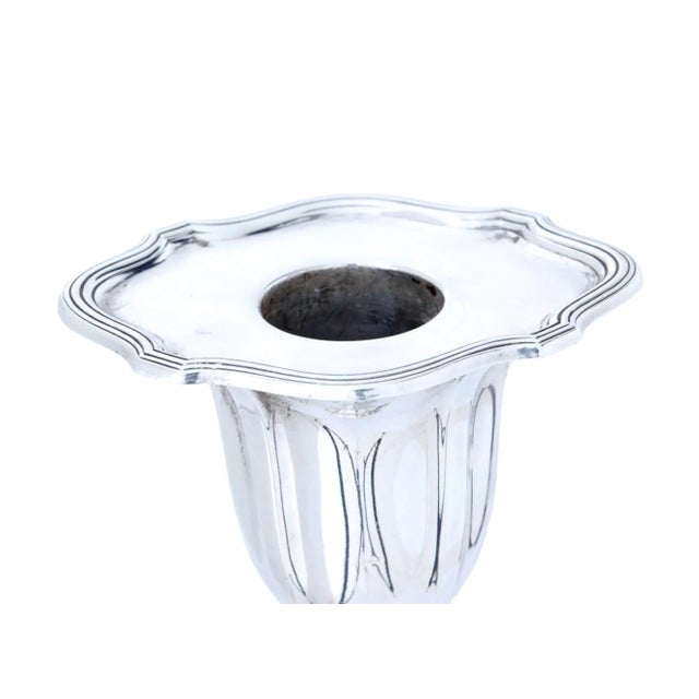 Pair of early 20th century sterling silver candlesticks circa 1922. Elegant pair of table candlesticks, with stamped...