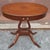 A Mersman Mahogany Oval single drawer Lyre Base Duncan Phyfe Occasion Table Measures 30" in width and 22" in length and...