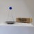 Table lamp model “Gemma”, large size, manufactured by Skipper. Granite base and blue coloured plexyglass diffuser....