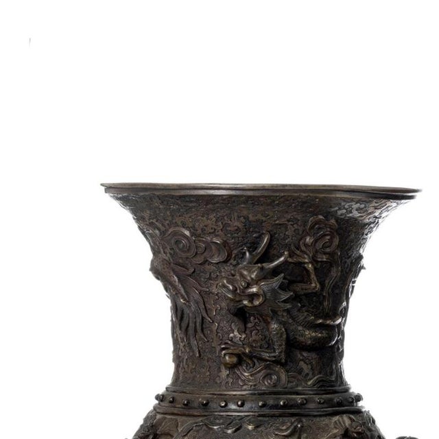 Asian art - Pair of Japanese bronze vases (45 cm). Japanese; Meiji period; bronze with relief decoration of dragons,...