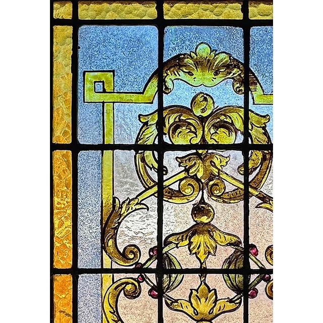 Antique, 19th century stained and textured glass acid etched panel in wooden encasement. One minor crack. Munich studio made.
