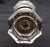 Vintage octagon clear glass door knob set with a bullet center and brass rosettes. Good condition with appropriate wear...