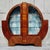 A striking Art Deco circular display cabinet dating to circa 1920, beautifully constructed from walnut and beech and...