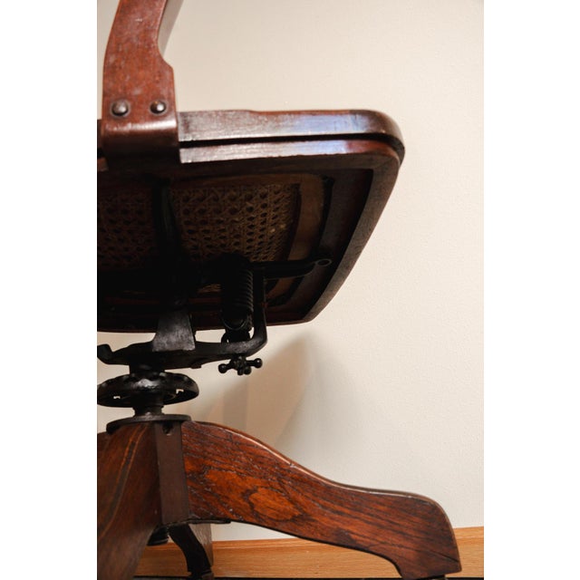 Wood Early 1900's H. Ehrlich & Sons Wood & Black Vinyl Rolling Swivel Office Lawyer's Chair For Sale - Image 7 of 16
