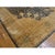 Commanding in both size and artistry, this monumental antique Kerman rug is a rare architectural treasure. Measuring an...