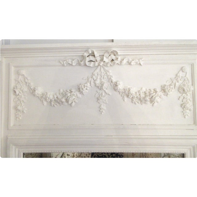 Antique Huge French Trumeau from France with bow & roses swags carvings and painted finish.