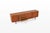 Danish teak sideboard designed in the 1960s and produced by Axel Christensen Odder (ACO Møbler). This refined mid-century...