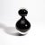 Indulge in the sheer elegance of this hand-blown Murano bottle, a true masterpiece crafted from the finest black onyx...