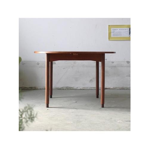 Extendable round table Date 1960 Style Nordic Origin Italy Materials Teak Model Round Condition Preserved