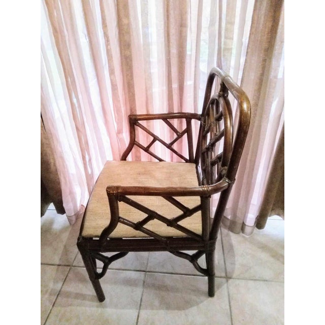 The vintage mid-century Chinese Chippendale style bamboo side chair is a stunning piece that embodies elegance and...